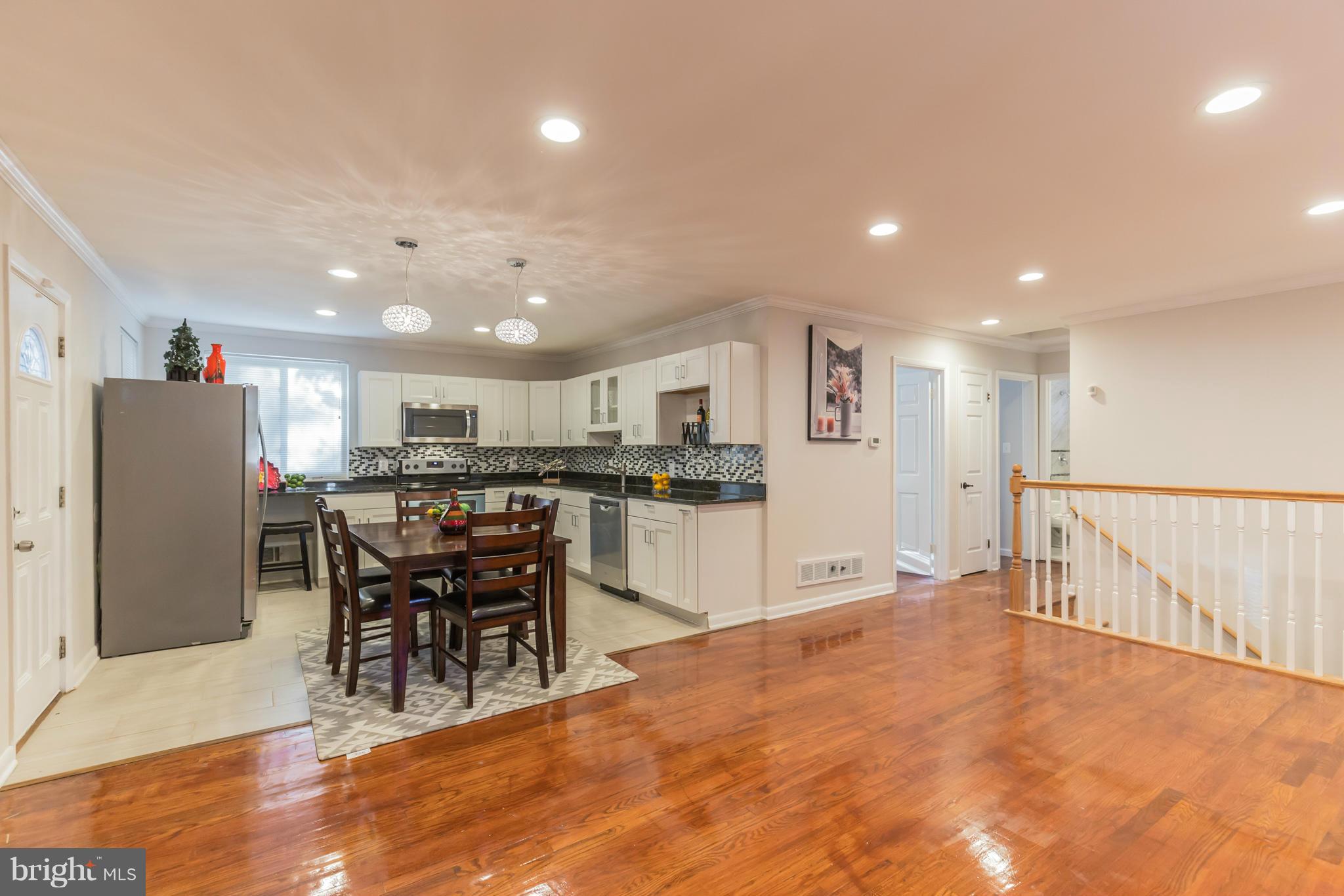 8303 Allentown Road Fort Washington, MD 20744 - Photo 6 of 30 a view of a kitchen and dining room
