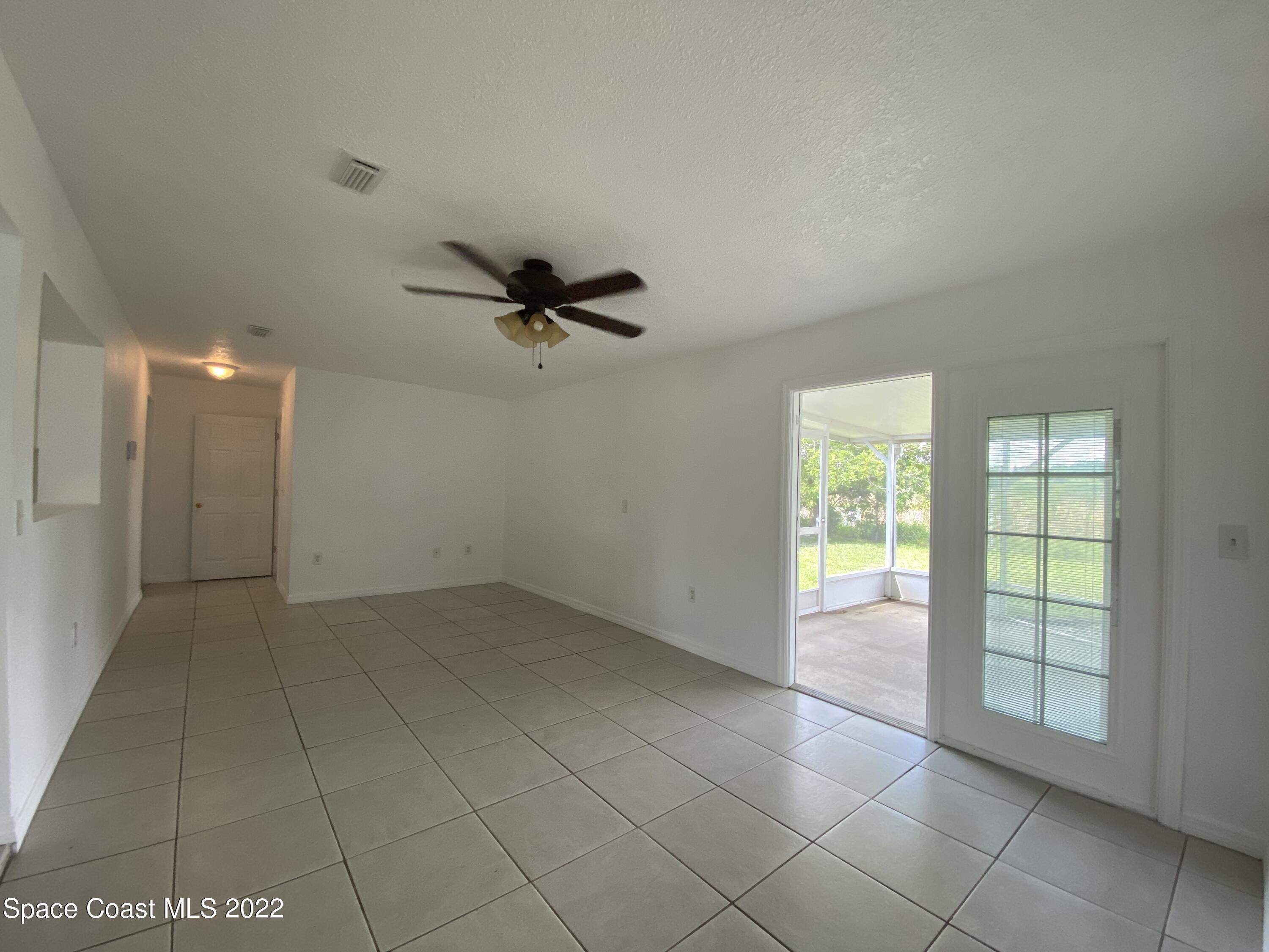 4120 Duke Street Melbourne, FL 32901 - Photo 17 of 49 a view of an empty room with a window