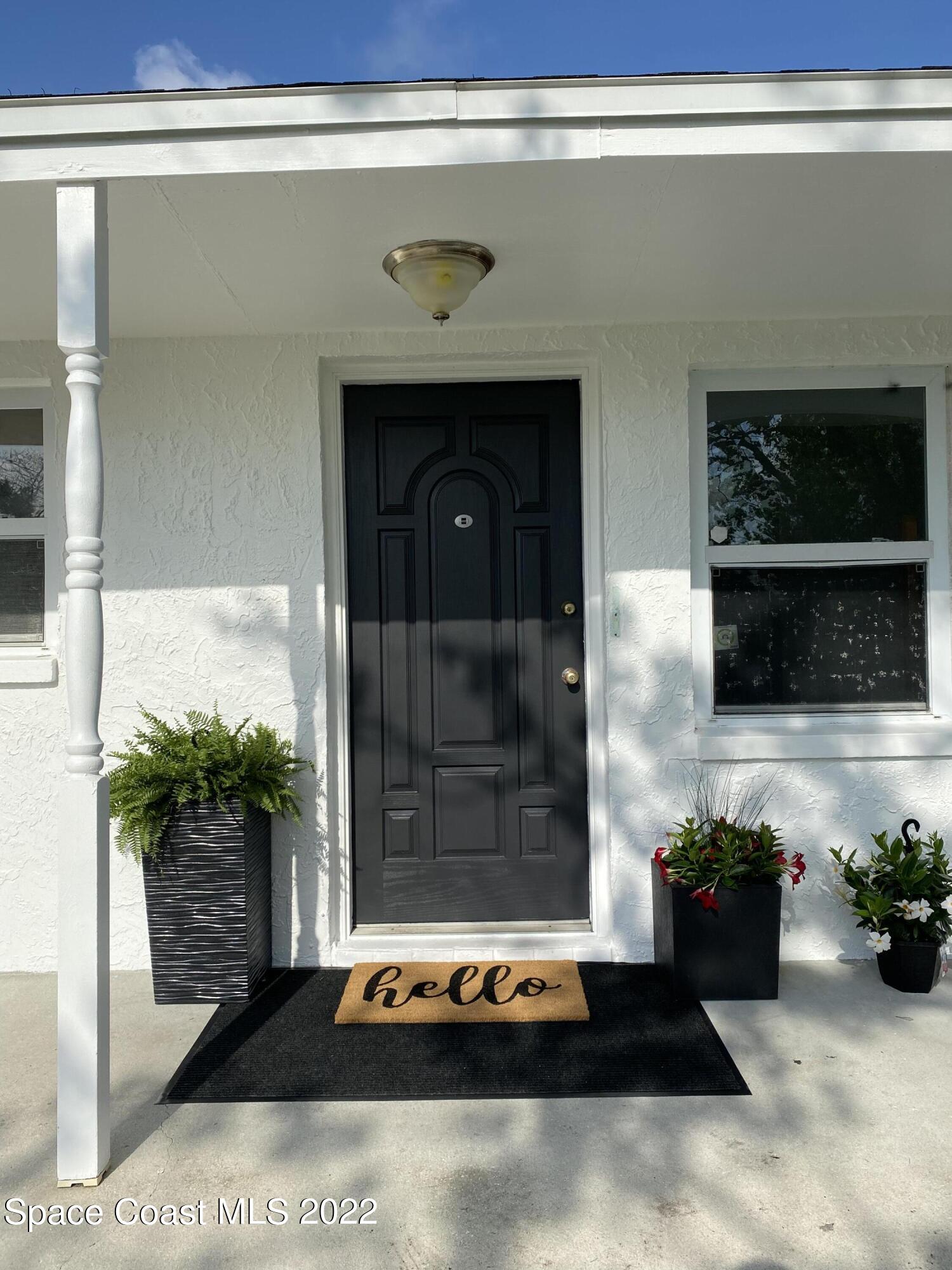 4120 Duke Street Melbourne, FL 32901 - Photo 2 of 49 a living room with furniture