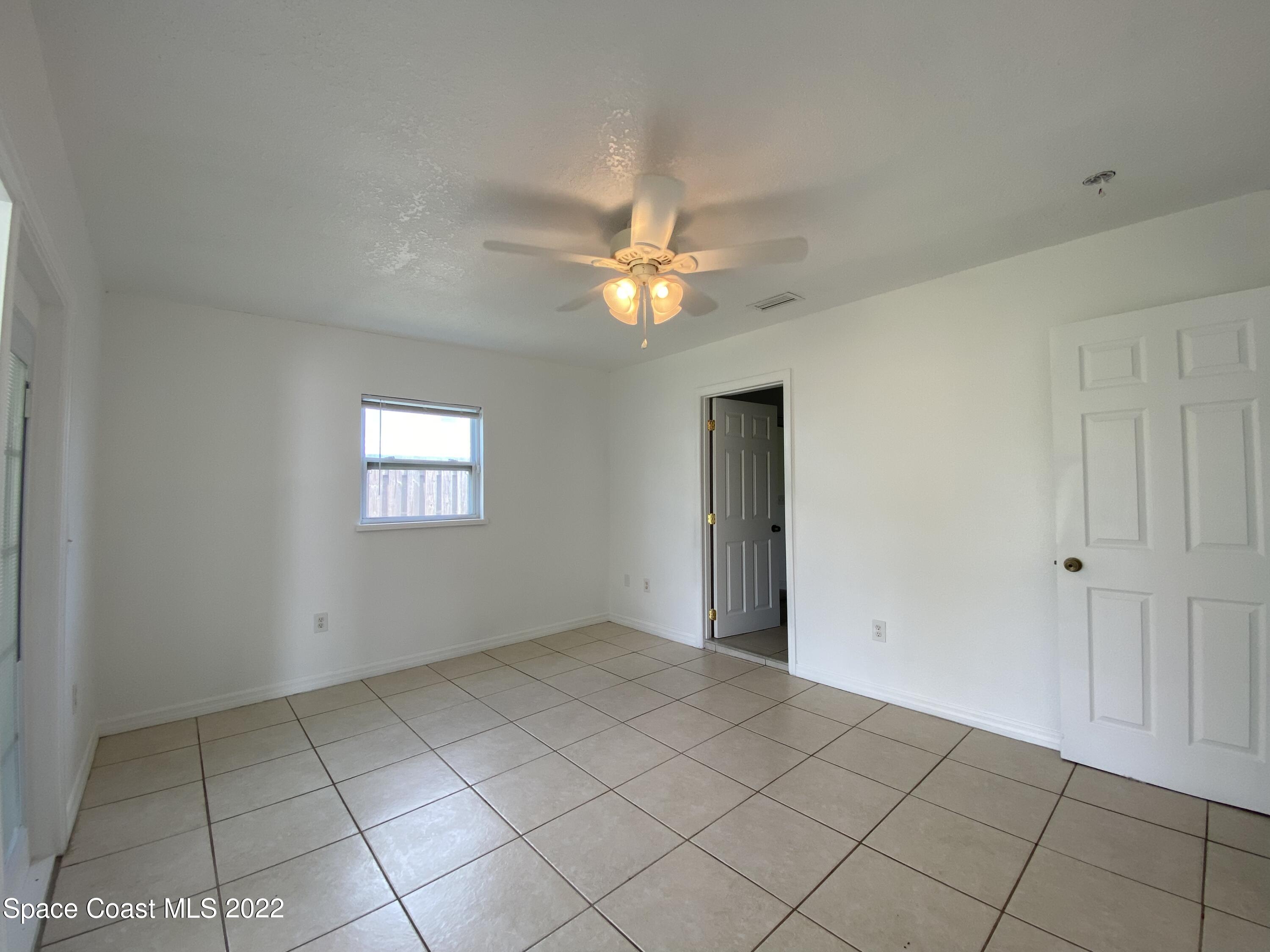 4120 Duke Street Melbourne, FL 32901 - Photo 24 of 49 a view of an empty room and window