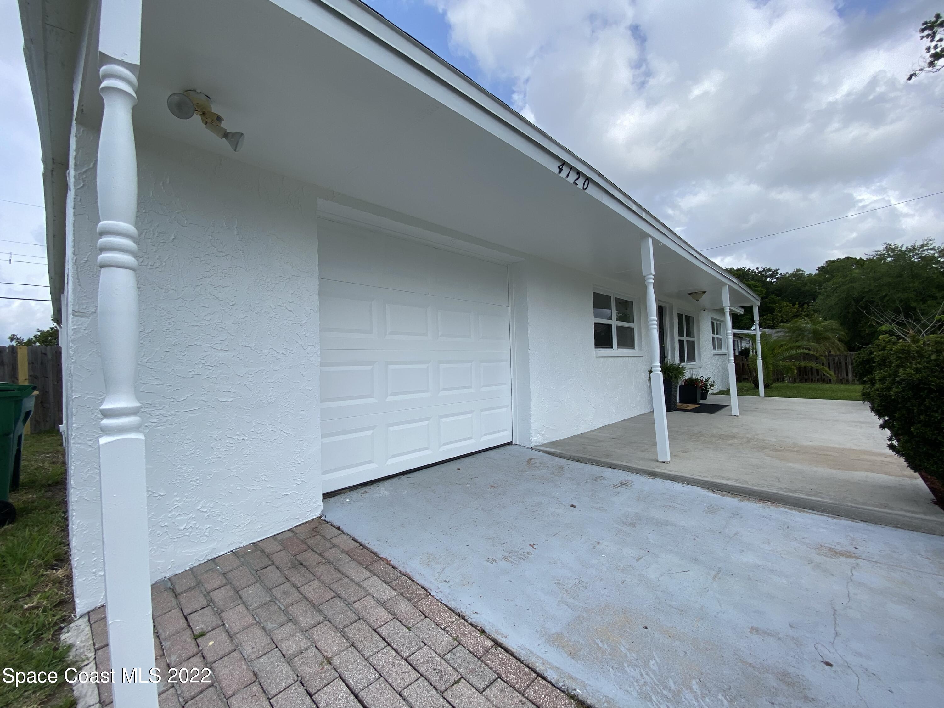 4120 Duke Street Melbourne, FL 32901 - Photo 3 of 49 a view of a car garage