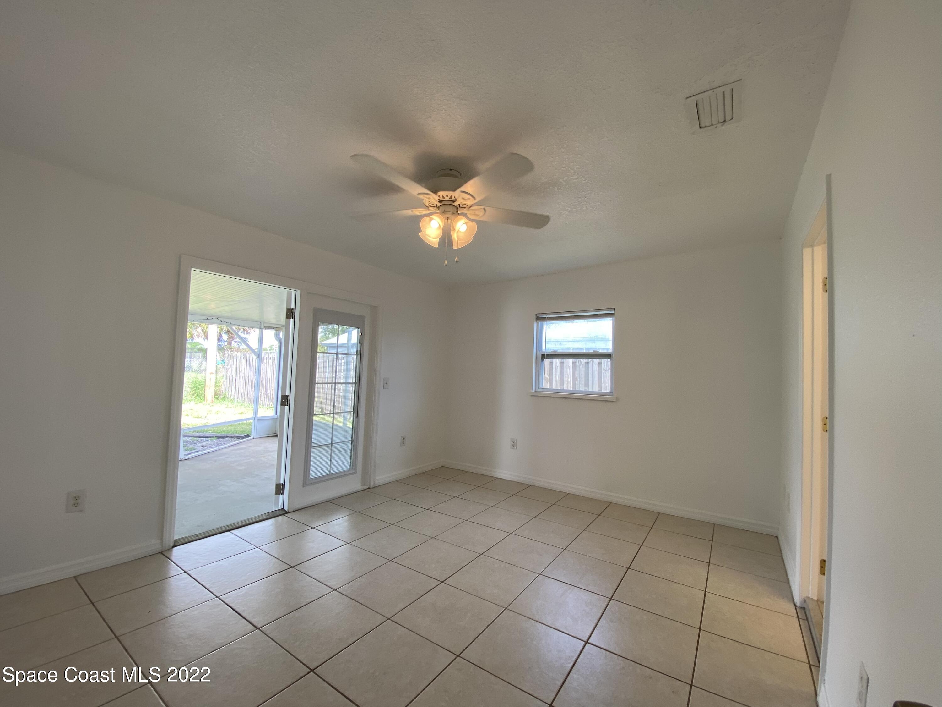 4120 Duke Street Melbourne, FL 32901 - Photo 32 of 49 a view of an empty room with a window