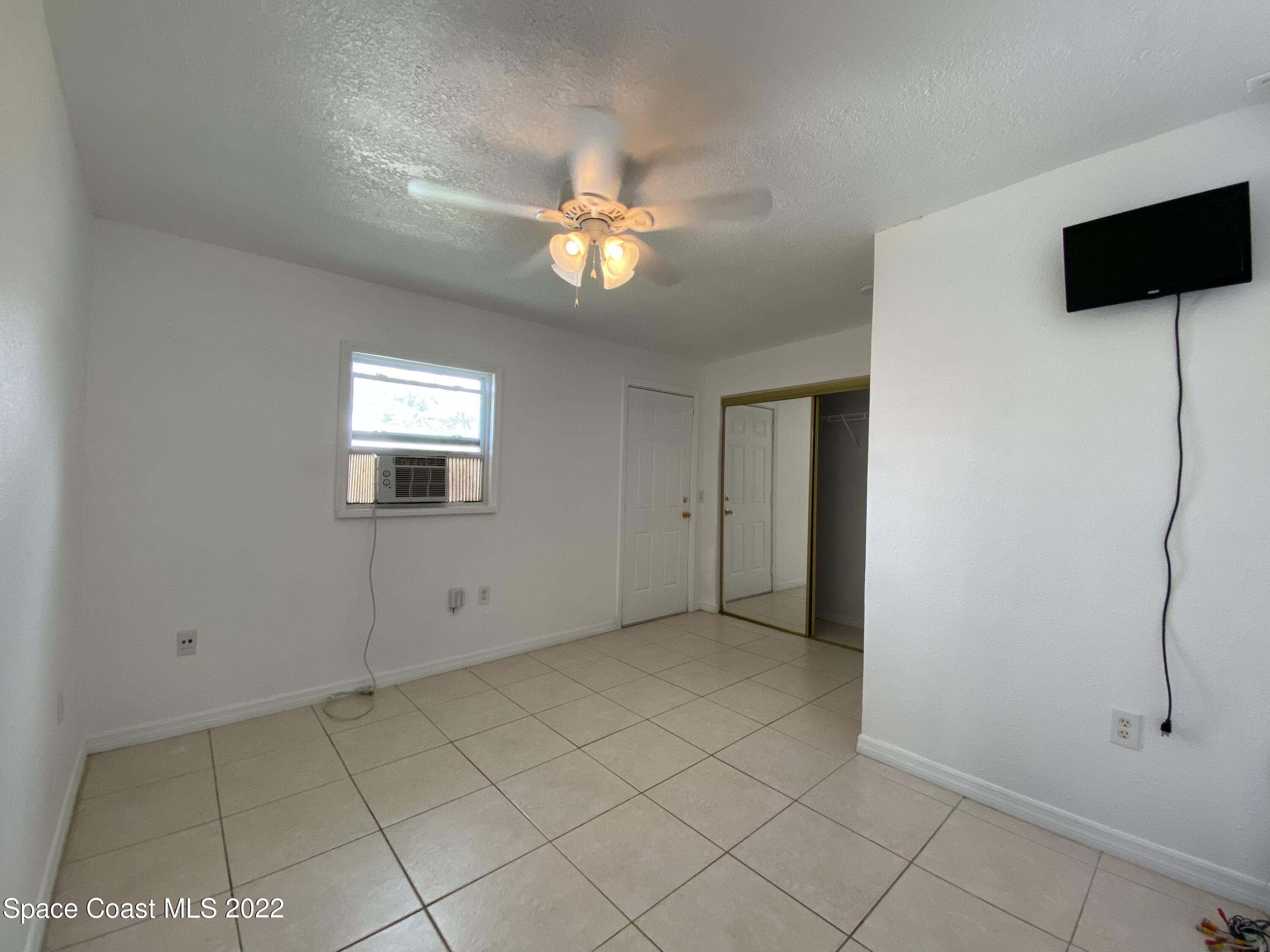 4120 Duke Street Melbourne, FL 32901 - Photo 46 of 49 a view of empty room with fan
