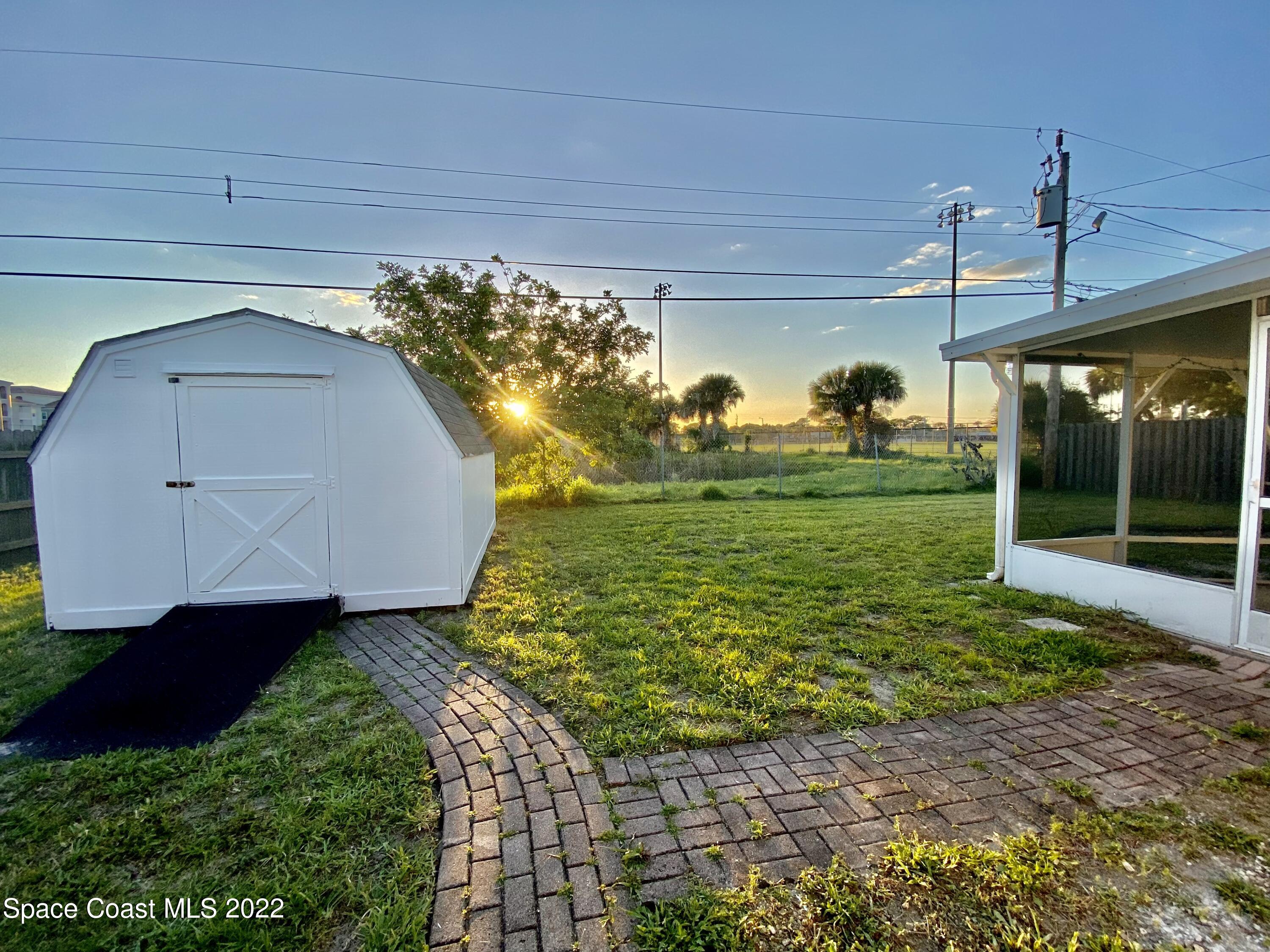 4120 Duke Street Melbourne, FL 32901 - Photo 5 of 49 a view of a back yard of the house