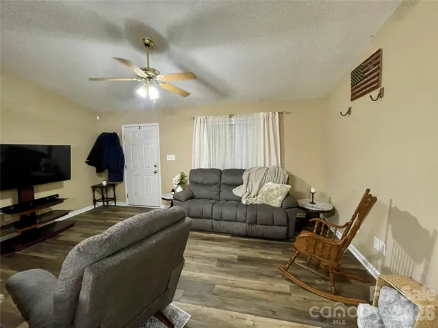 a bedroom with a bed and a desk