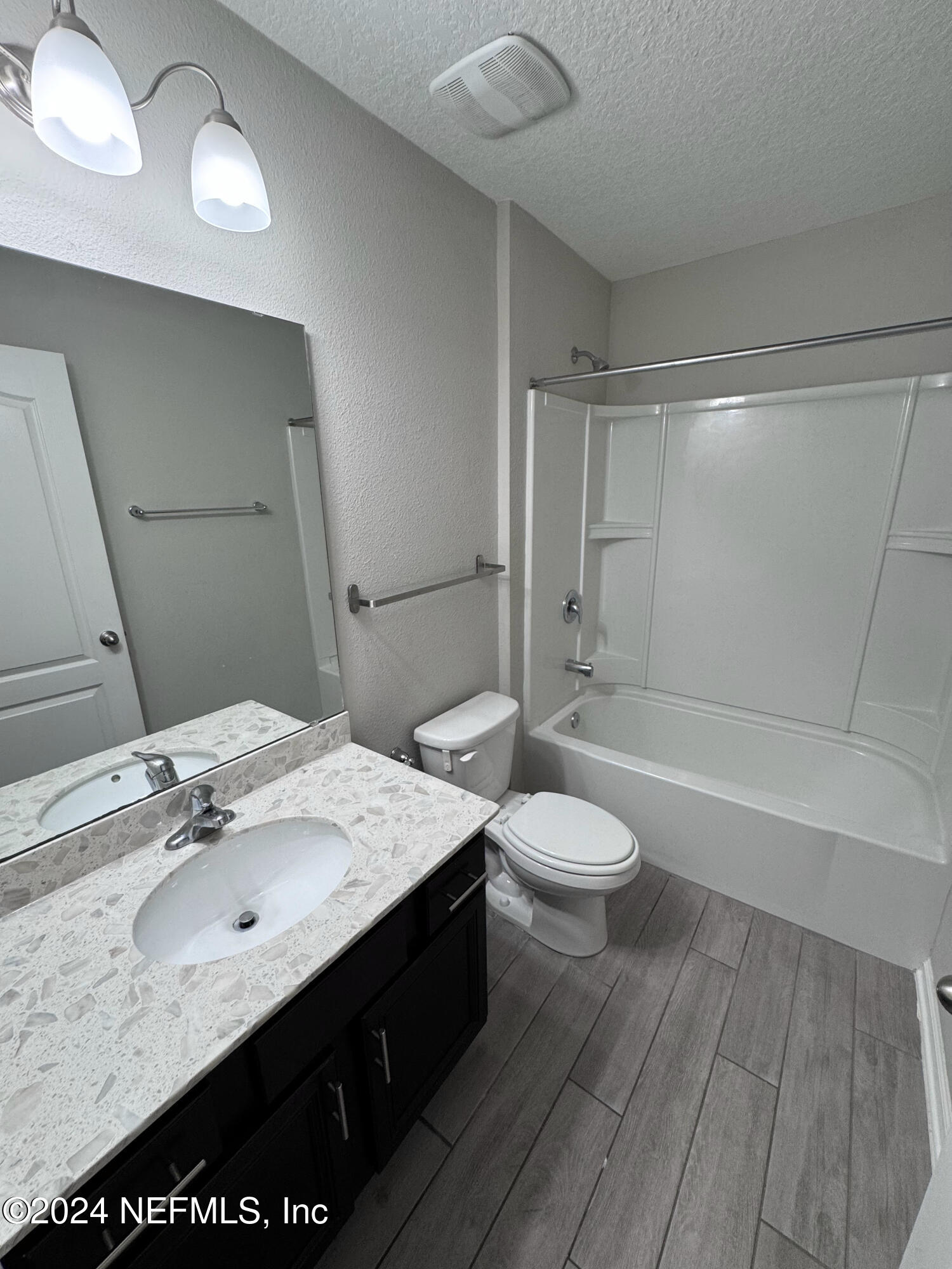 80 Balmoral Castle Drive St. Johns, FL 32259 - Photo 12 of 17 a bathroom with a sink a toilet and shower