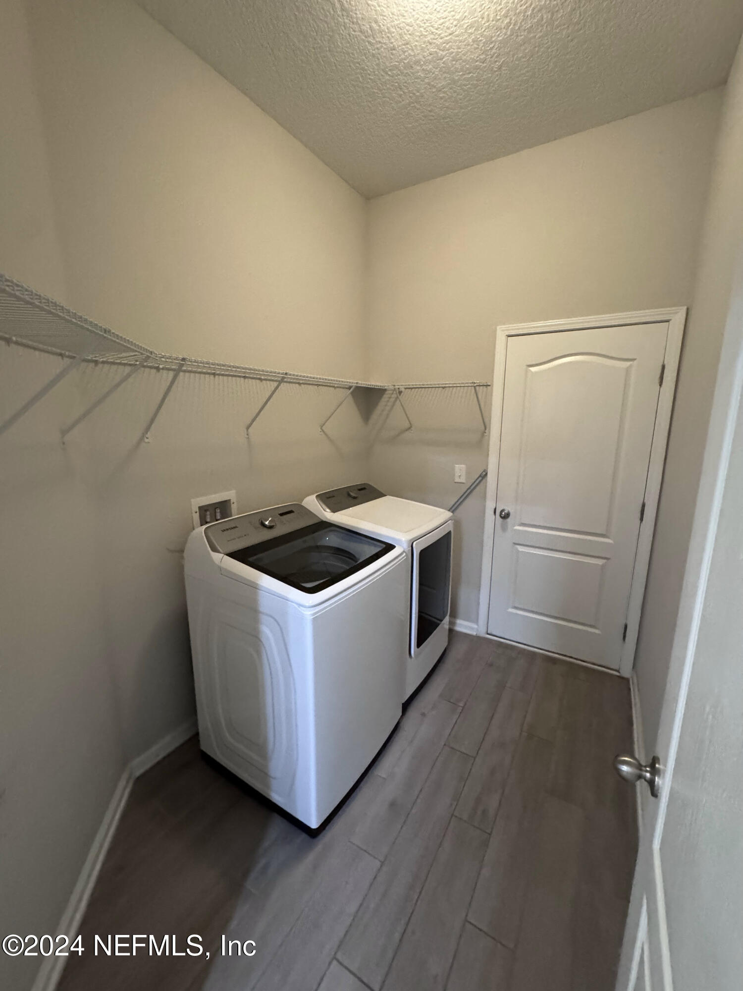 80 Balmoral Castle Drive St. Johns, FL 32259 - Photo 17 of 17 a utility room with washer and dryer
