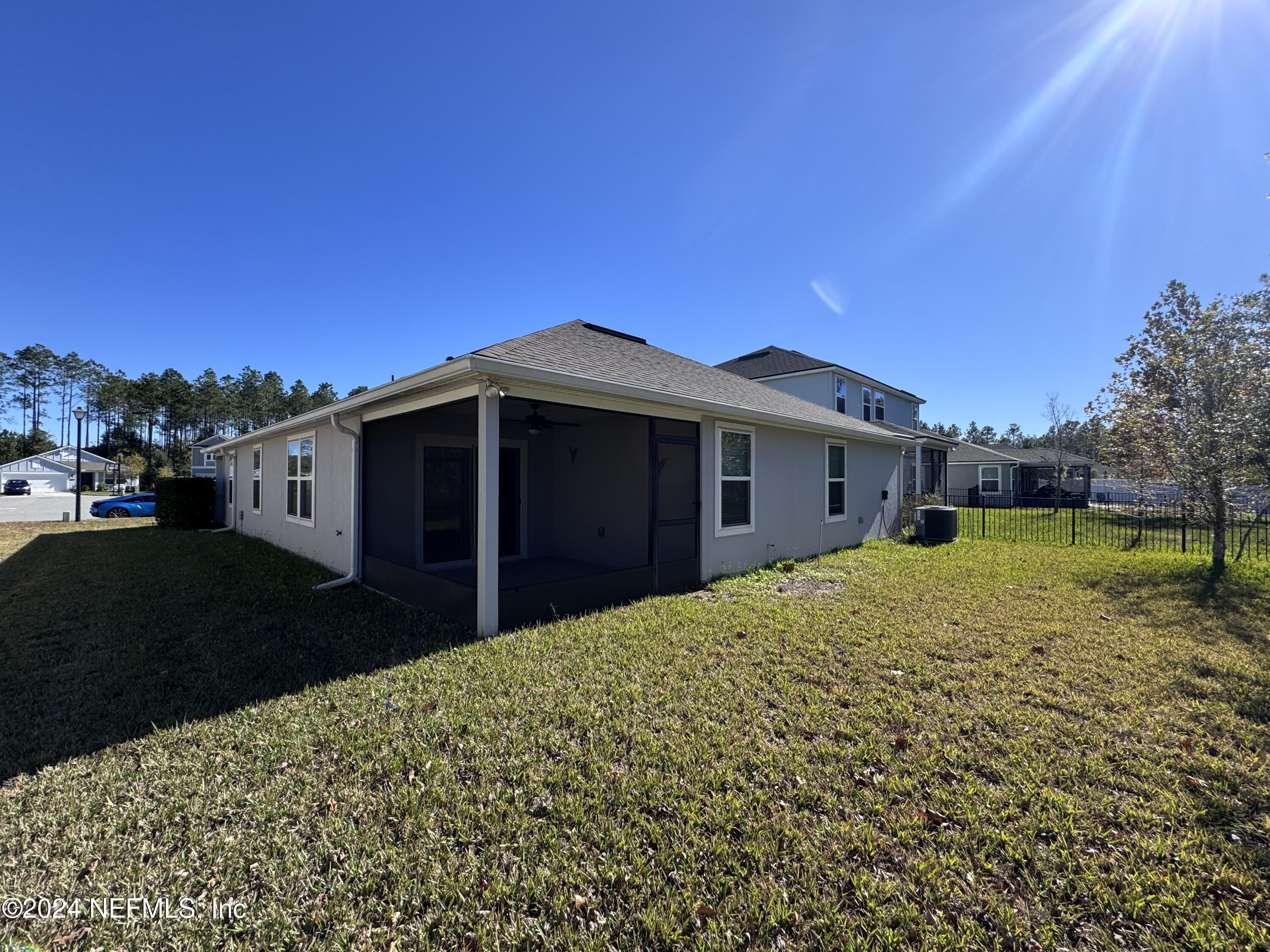 80 Balmoral Castle Drive St. Johns, FL 32259 - Photo 8 of 17 a view of a house with a yard