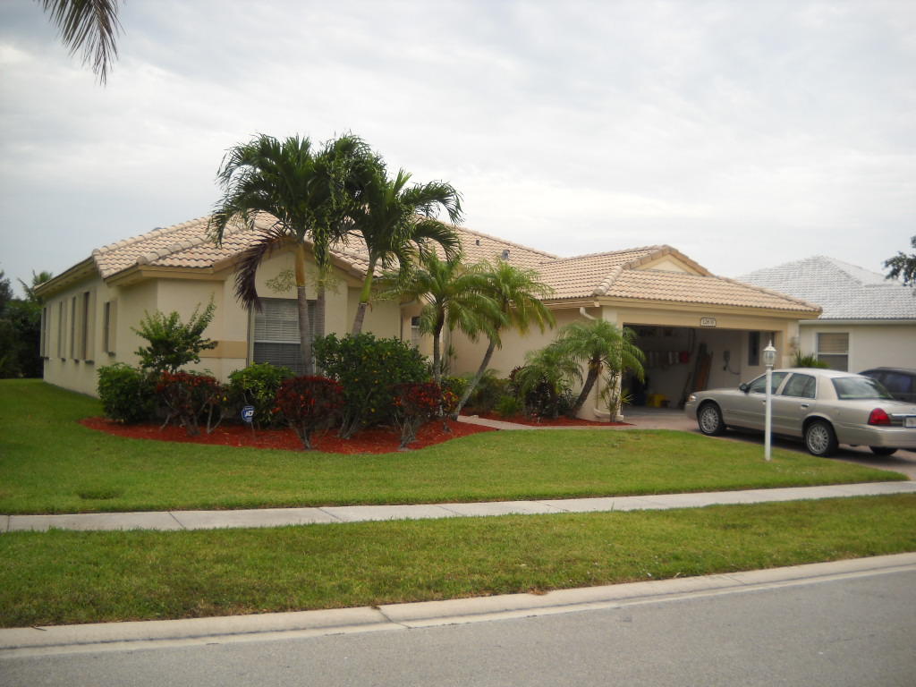 12831 Maypan Drive Boca Raton, FL 33428 - Photo 2 of 30 front with garage open