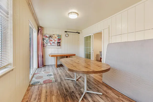 a bed room with a bed and a table