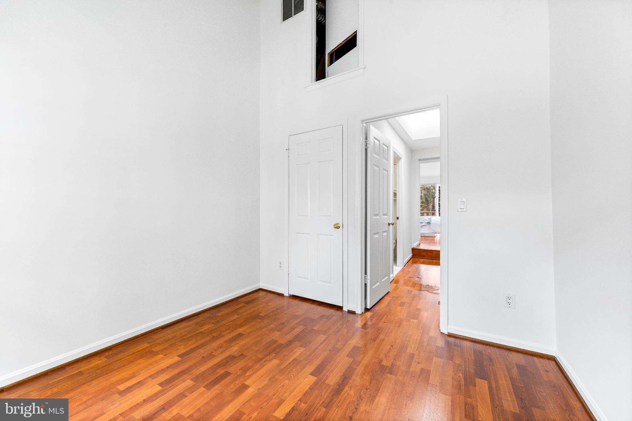 1046 Patapsco Street Baltimore, MD 21230 - Photo 13 of 19 a view of a hallway with wooden floor