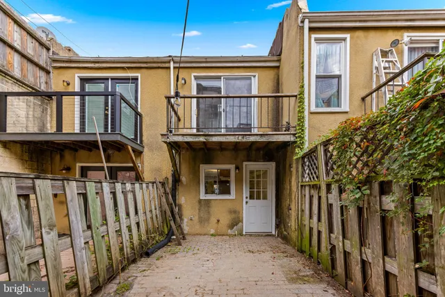 a view of a street with cars