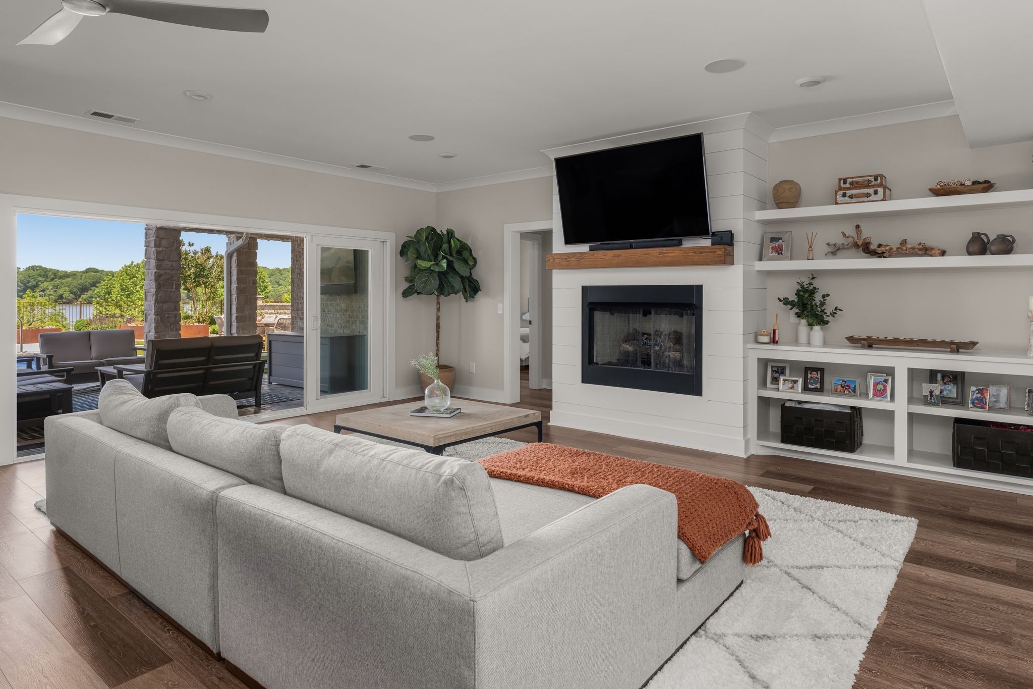 141 Kathryn Adele Lane Mount Juliet, TN 37122 - Photo 42 of 74 a living room with furniture a fireplace and a flat screen tv