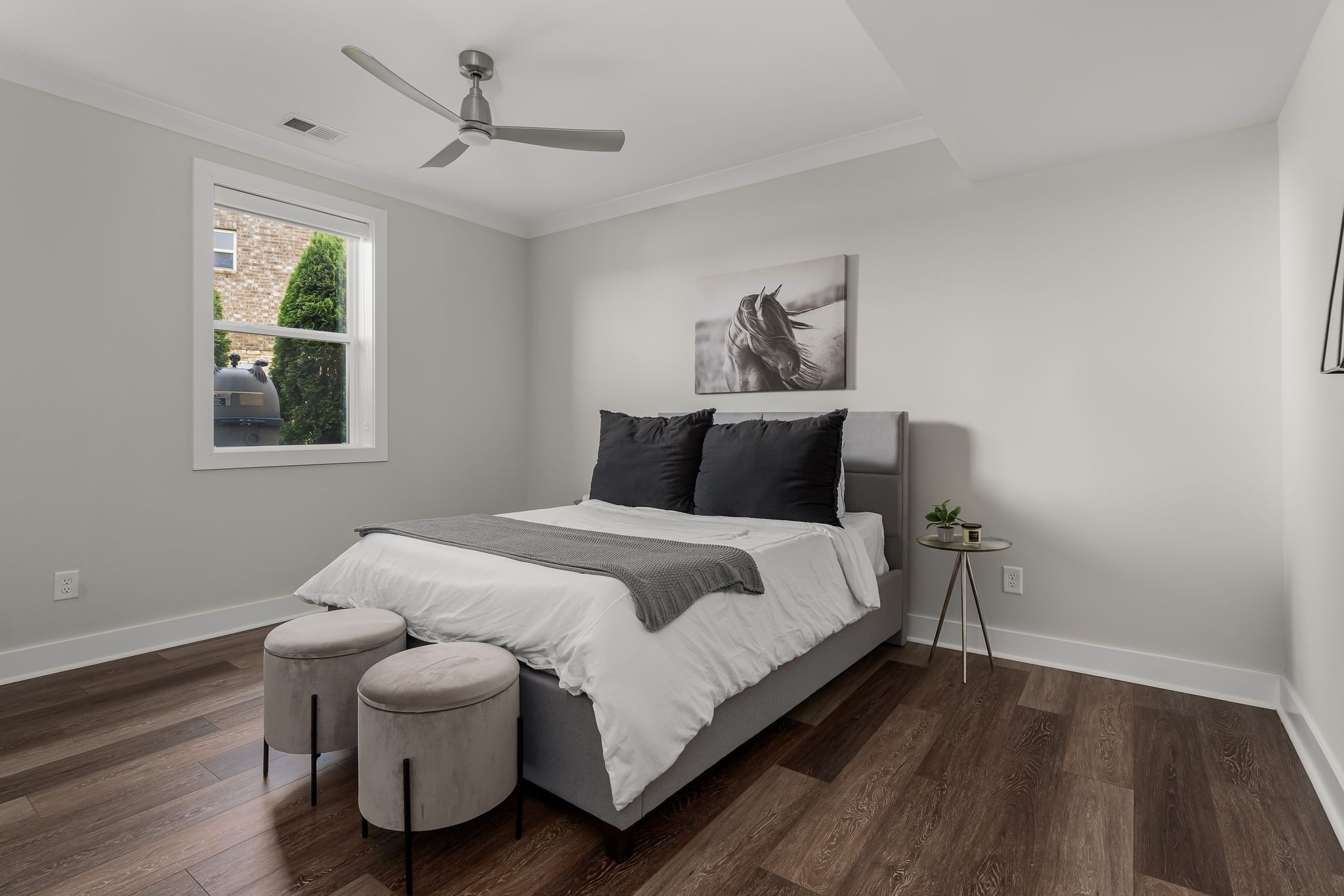 141 Kathryn Adele Lane Mount Juliet, TN 37122 - Photo 48 of 74 a bedroom with a bed and wooden floor