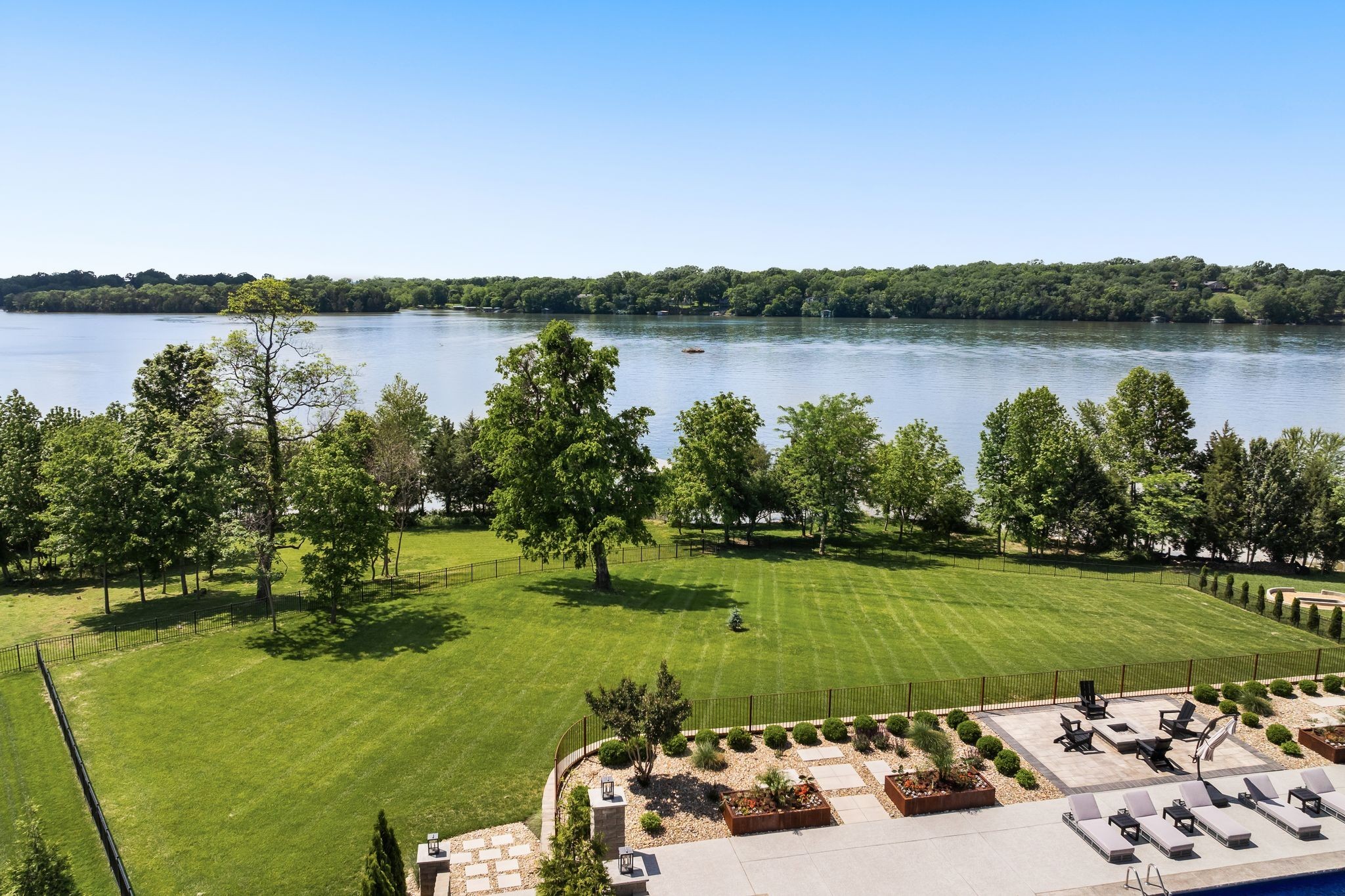 141 Kathryn Adele Lane Mount Juliet, TN 37122 - Photo 73 of 74 a view of a lake with a building in the background