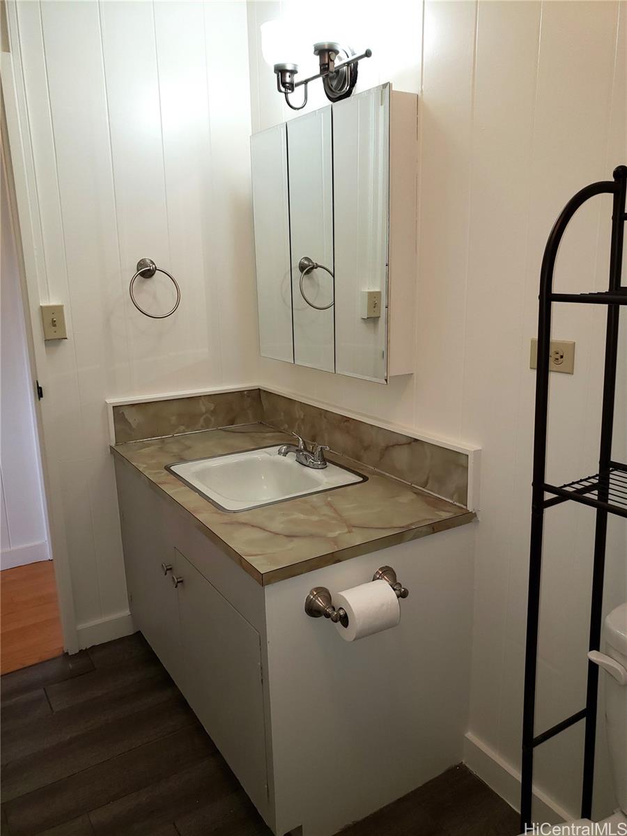 2313 Star Road, Unit A Honolulu, HI 96813 - Photo 12 of 21 a bathroom with a sink and mirror