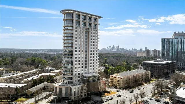 a view of a city with tall buildings