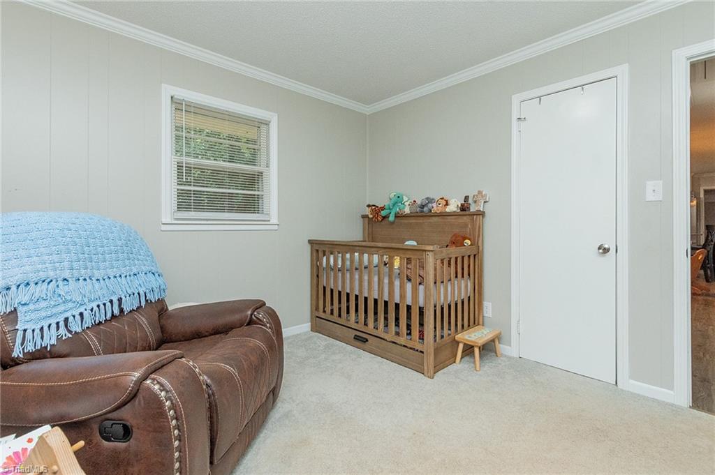 5947 Poley Road Browns Summit, NC 27214 - Photo 25 of 34 Bedroom 2