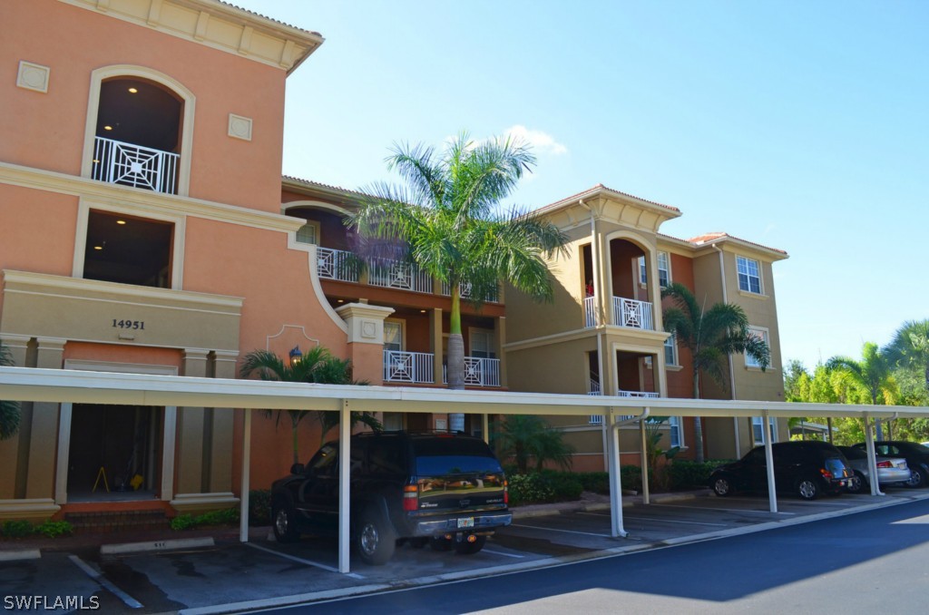 a view of multiple house with a street