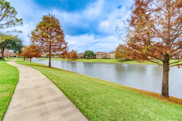 a view of entryway with wooden floor and stairs