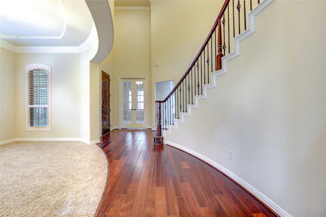 a kitchen with stainless steel appliances granite countertop refrigerator a sink and a stove