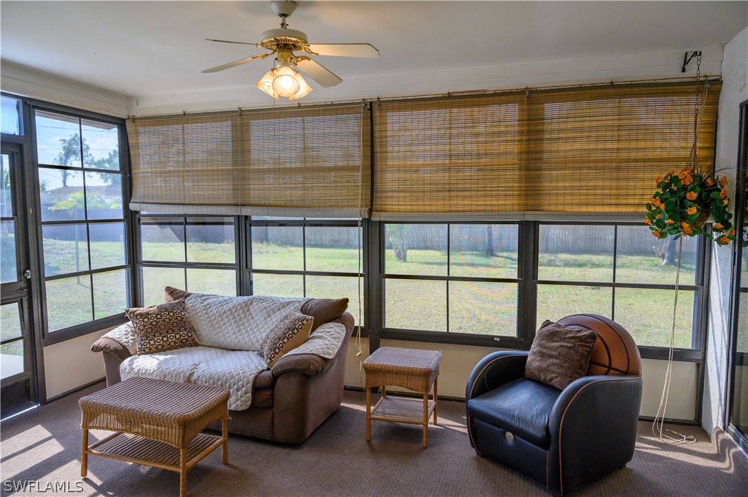 18430 Hepatica Road Fort Myers, FL 33967 - Photo 13 of 16 a living room with furniture and a window