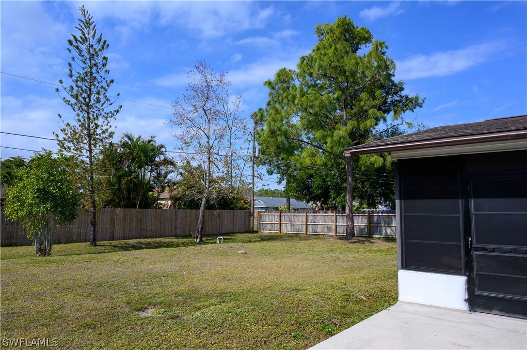18430 Hepatica Road Fort Myers, FL 33967 - Photo 16 of 16 a view of a backyard with a small cabin