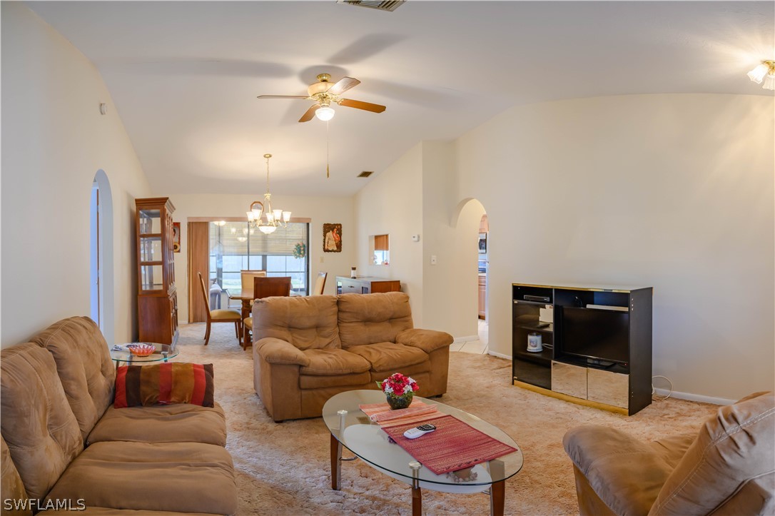 18430 Hepatica Road Fort Myers, FL 33967 - Photo 5 of 16 a living room with furniture and a flat screen tv