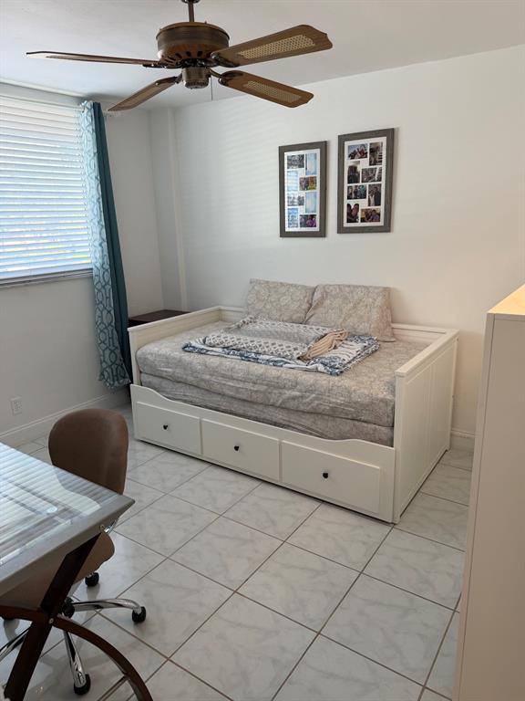 4502 North Federal Highway, Unit 235D Lighthouse Point, FL 33064 - Photo 17 of 40 a living room with furniture and a table