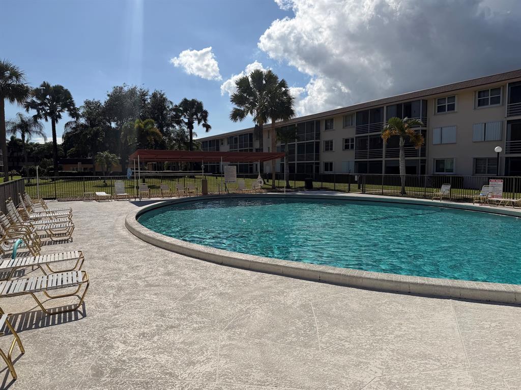 4502 North Federal Highway, Unit 235D Lighthouse Point, FL 33064 - Photo 32 of 40 a view of a backyard