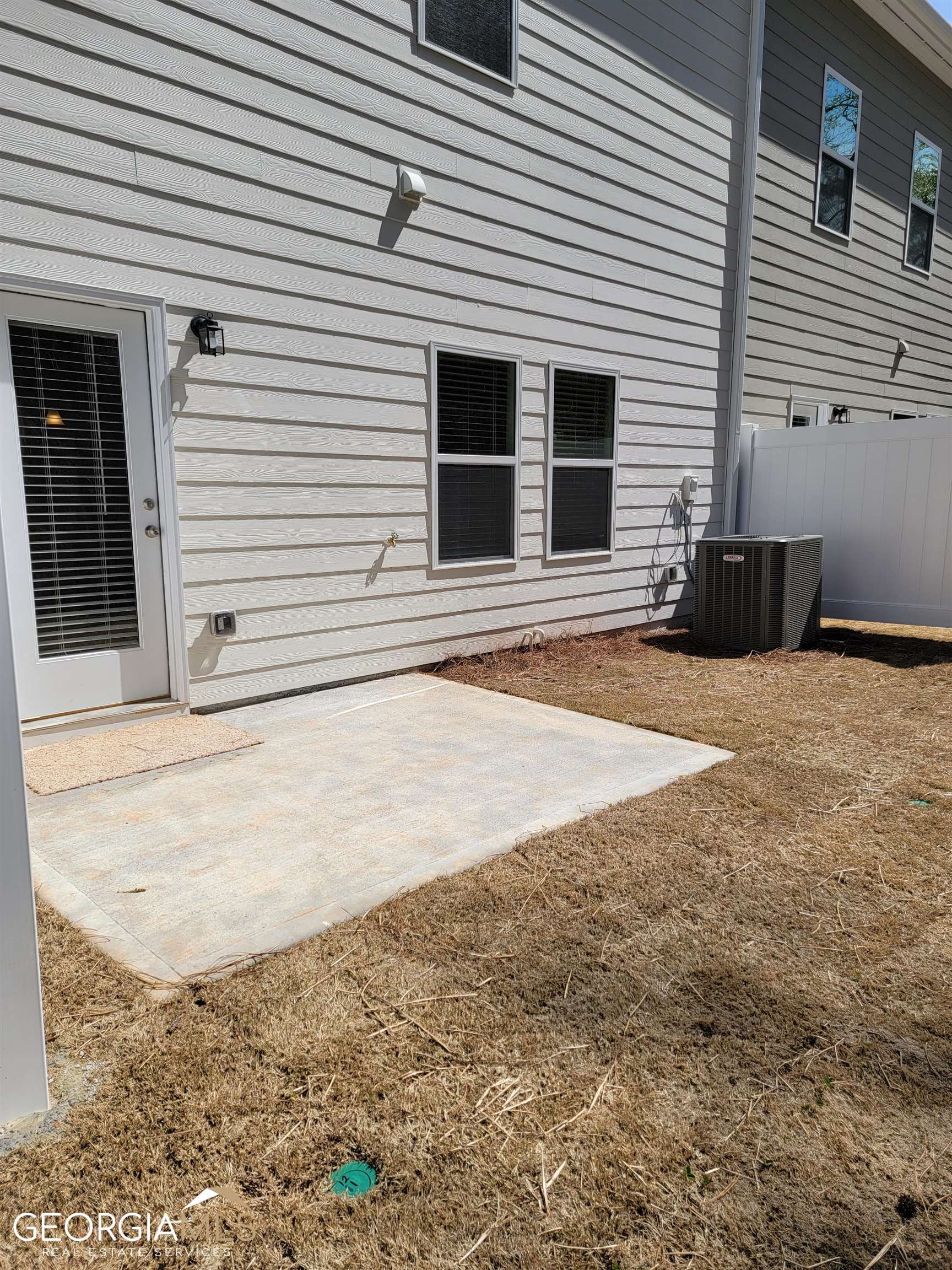 160 Madison Bend Holly Springs, GA 30188 - Photo 18 of 18 a view of a backyard of house
