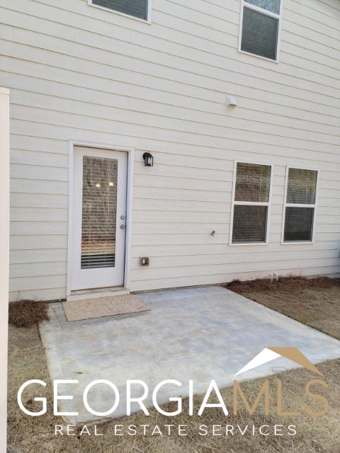 160 Madison Bend Holly Springs, GA 30188 - Photo 2 of 18 a view of a door of the house