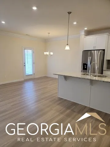 a view of a livingroom with furniture