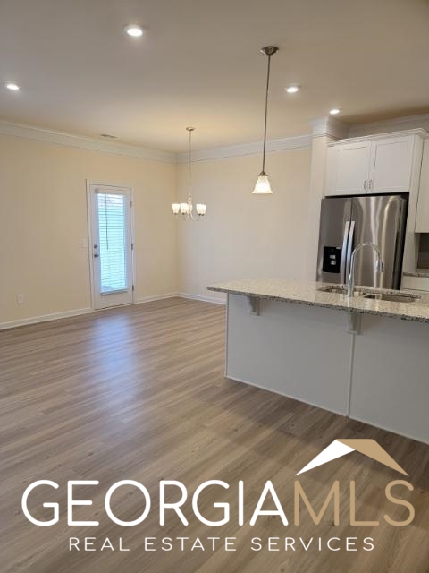 160 Madison Bend Holly Springs, GA 30188 - Photo 4 of 18 a view of a livingroom with furniture