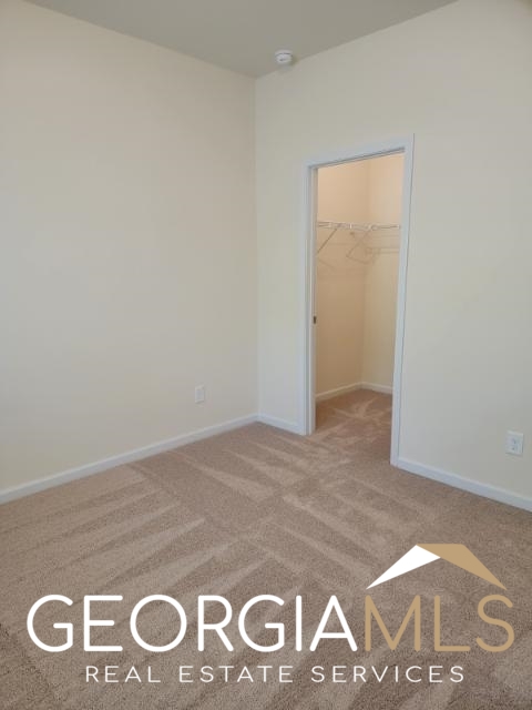 160 Madison Bend Holly Springs, GA 30188 - Photo 8 of 18 a view of an entryway
