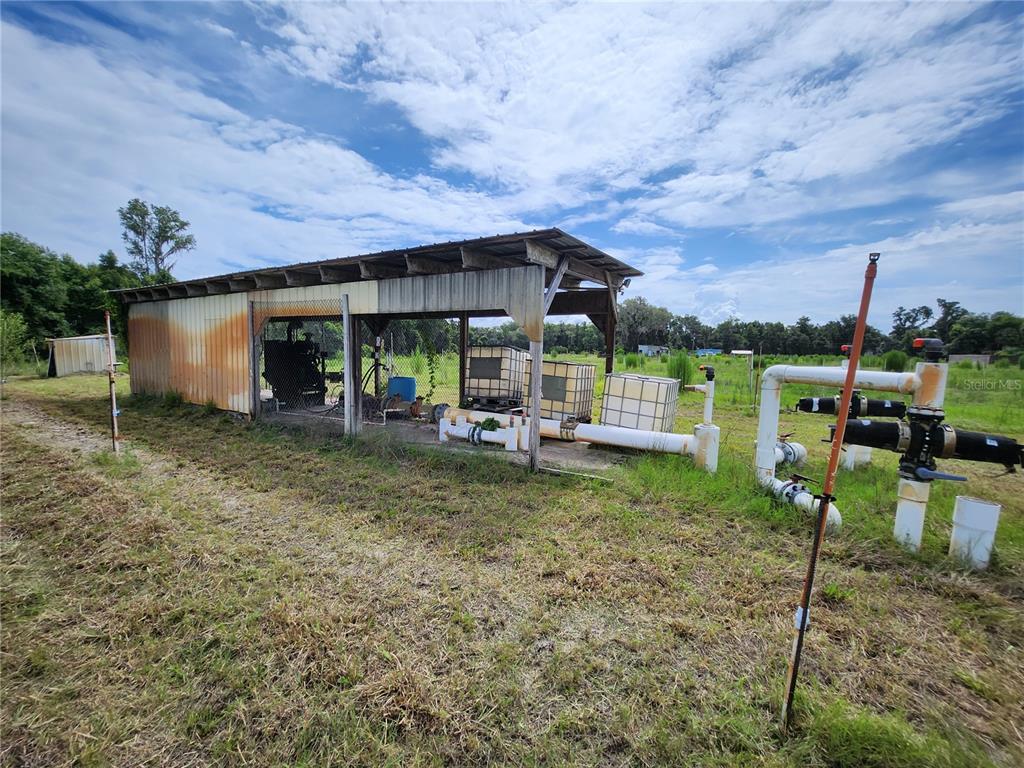 9333 East Bushnell Road Floral City, FL 34436 - Photo 21 of 28 a view of a backyard