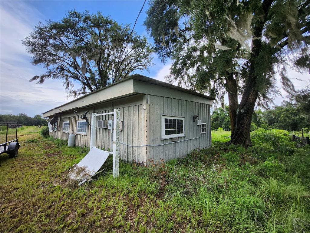 9333 East Bushnell Road Floral City, FL 34436 - Photo 3 of 28 a view of backyard with green space