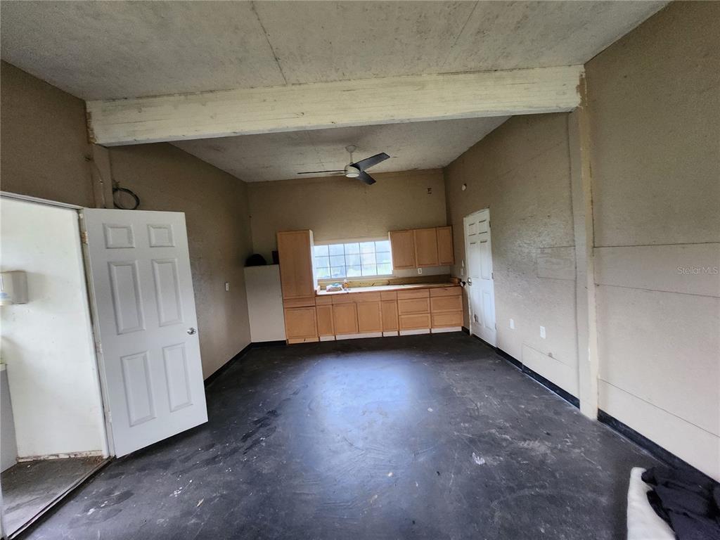 9333 East Bushnell Road Floral City, FL 34436 - Photo 8 of 28 a view of an empty room with a window