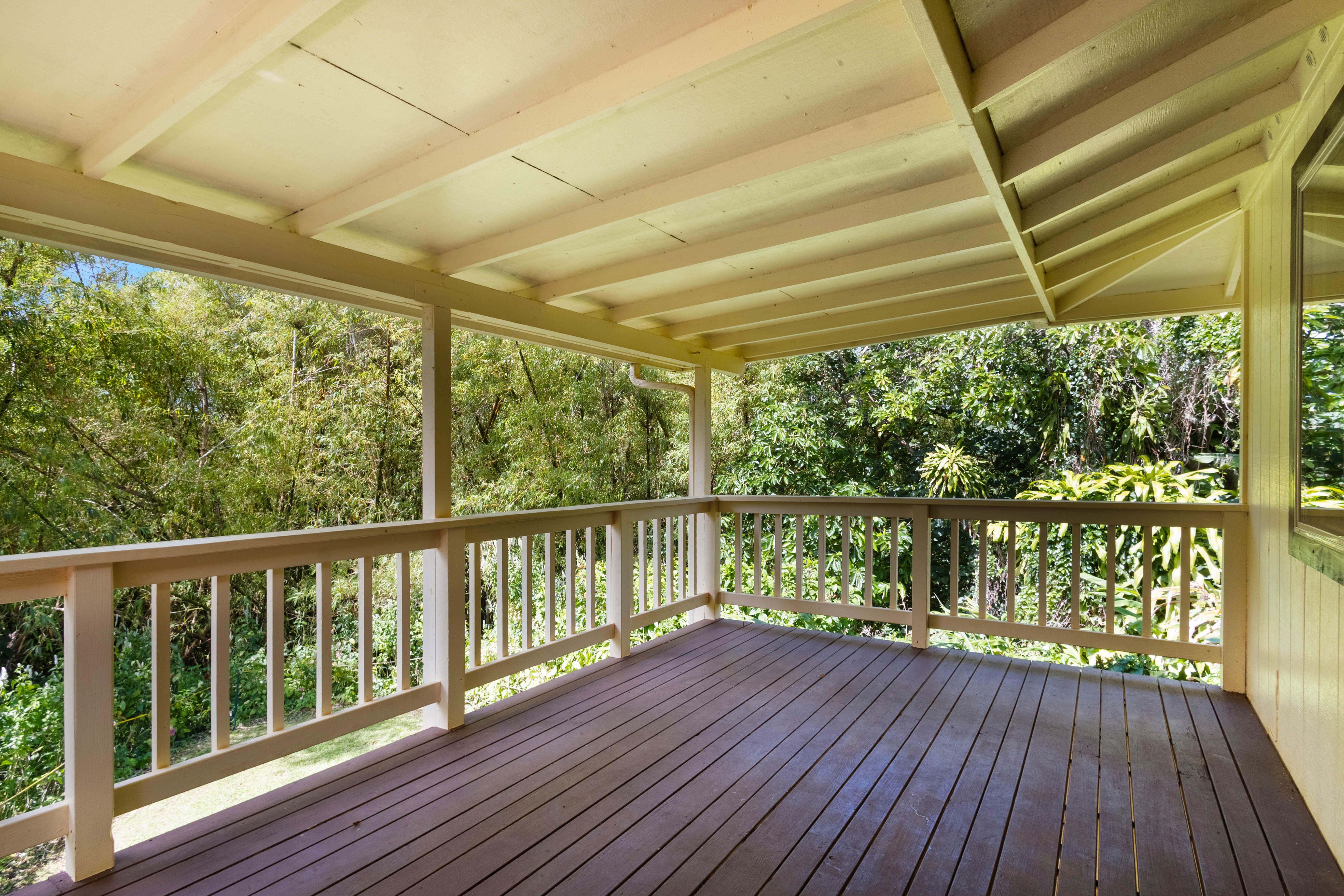 4085 B Noho Road Koloa, HI 96756 - Photo 18 of 30 a view of a balcony with wooden floor