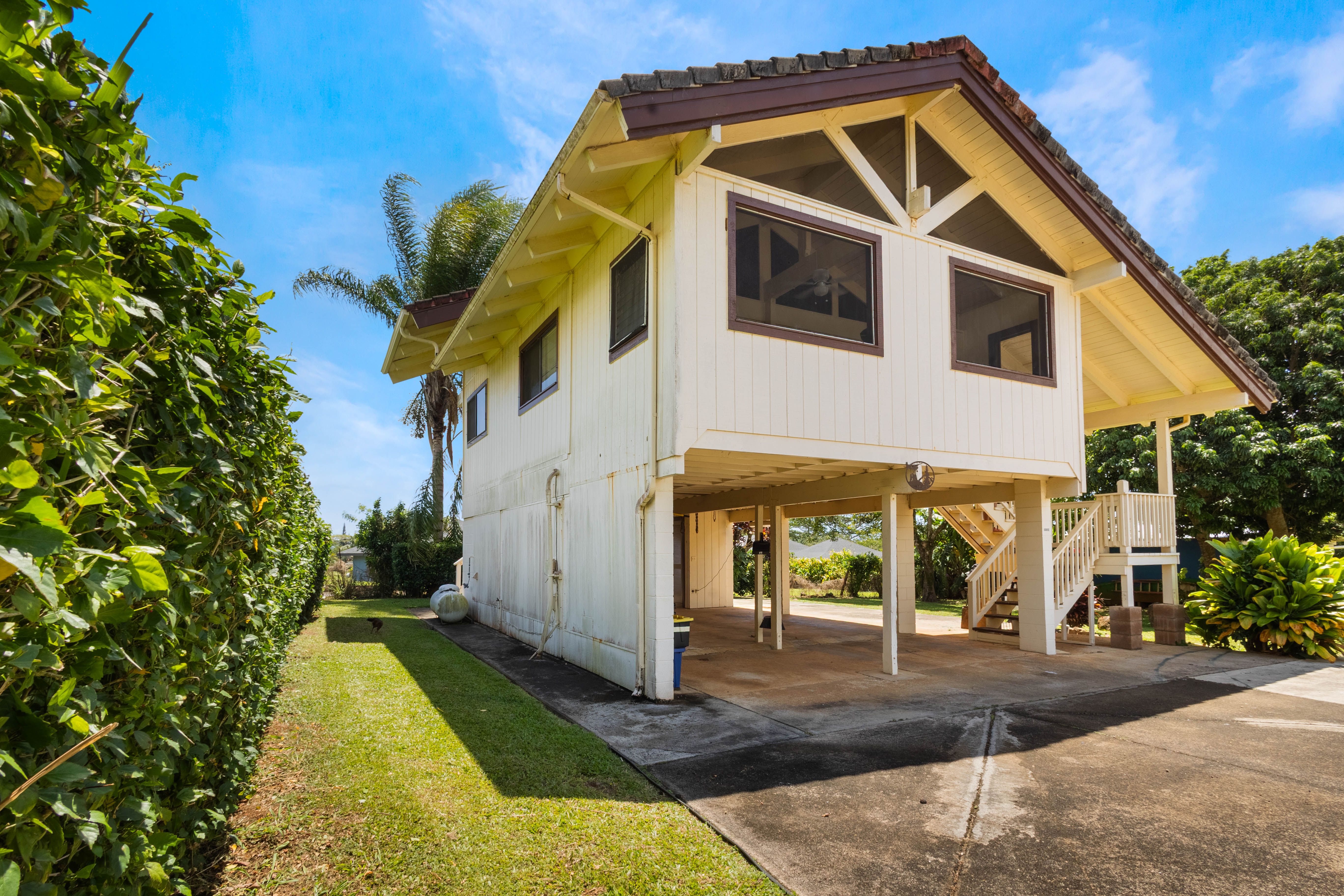 4085 B Noho Road Koloa, HI 96756 - Photo 21 of 30 a view of a house with a yard