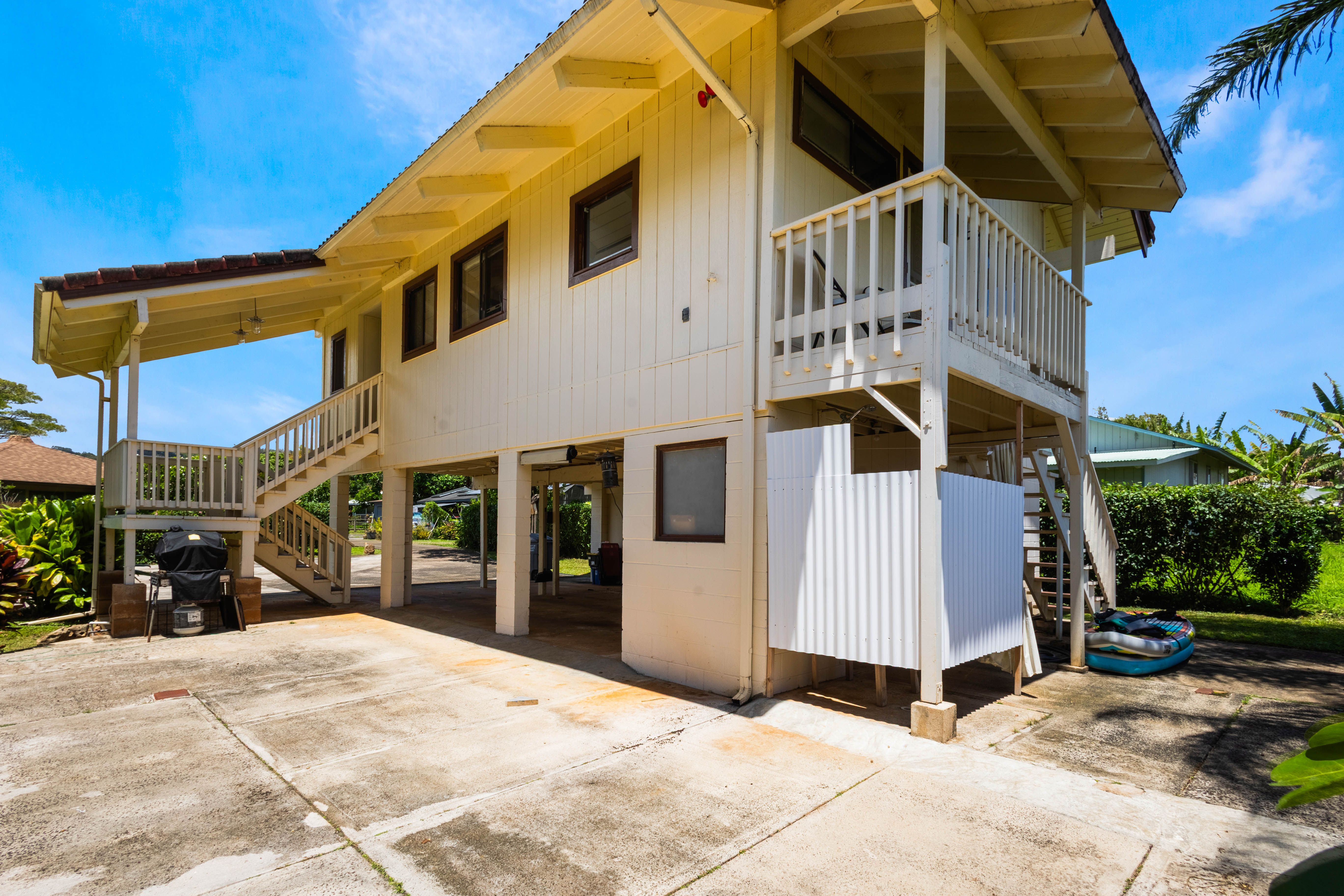 4085 B Noho Road Koloa, HI 96756 - Photo 22 of 30 a view of a building with a yard