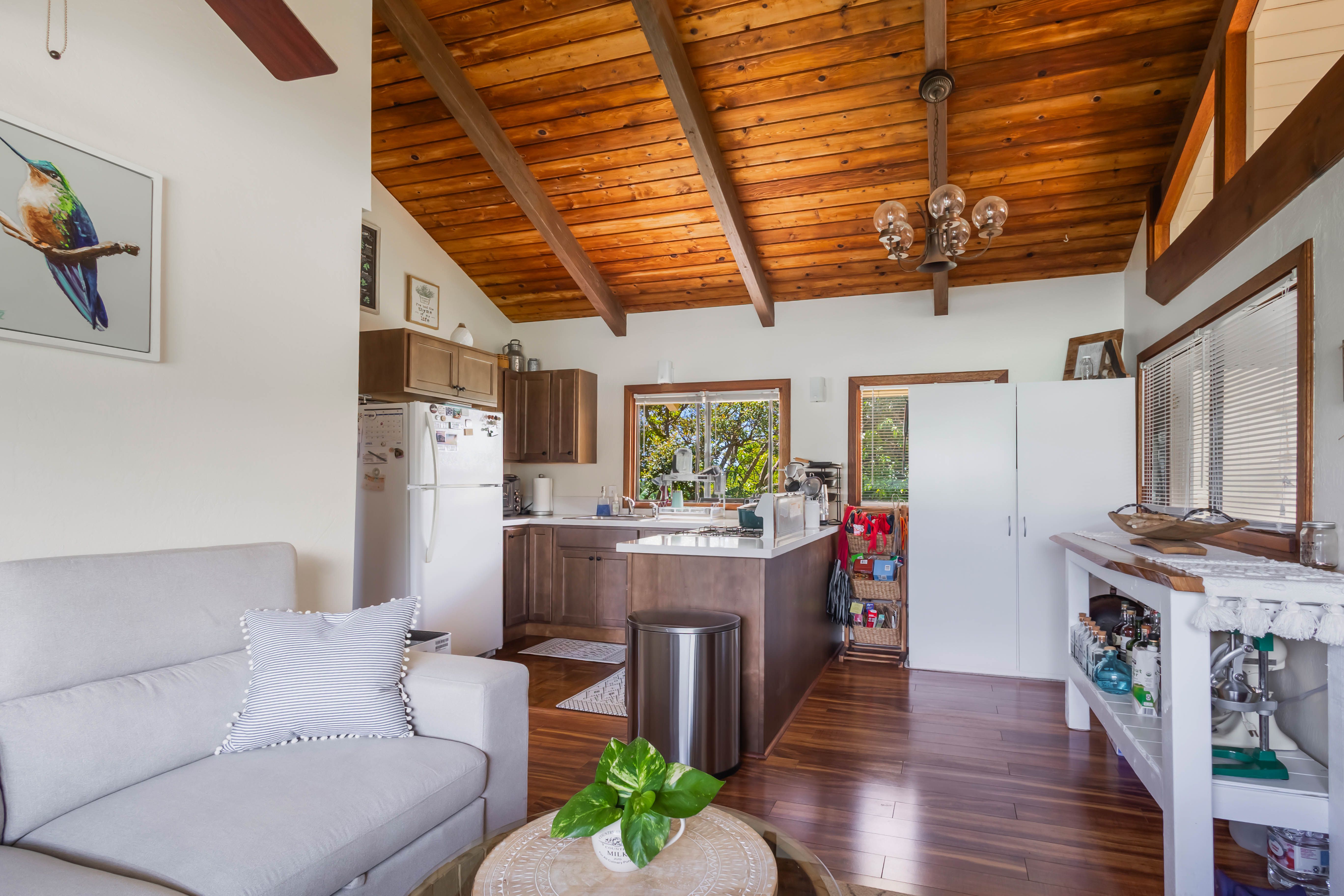 4085 B Noho Road Koloa, HI 96756 - Photo 24 of 30 a living room with furniture and a fireplace