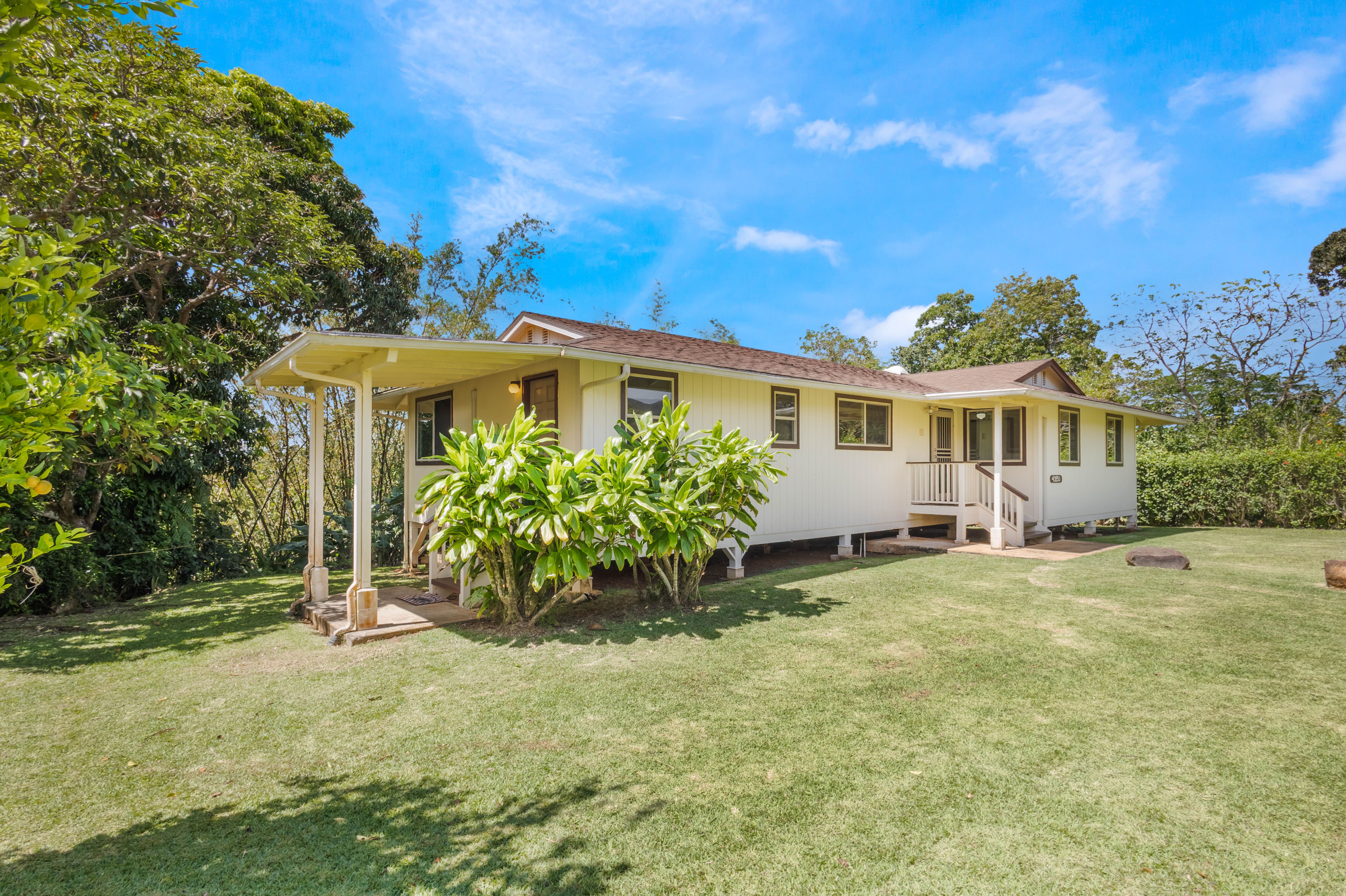 4085 B Noho Road Koloa, HI 96756 - Photo 5 of 30 a view of a house with backyard and a tree