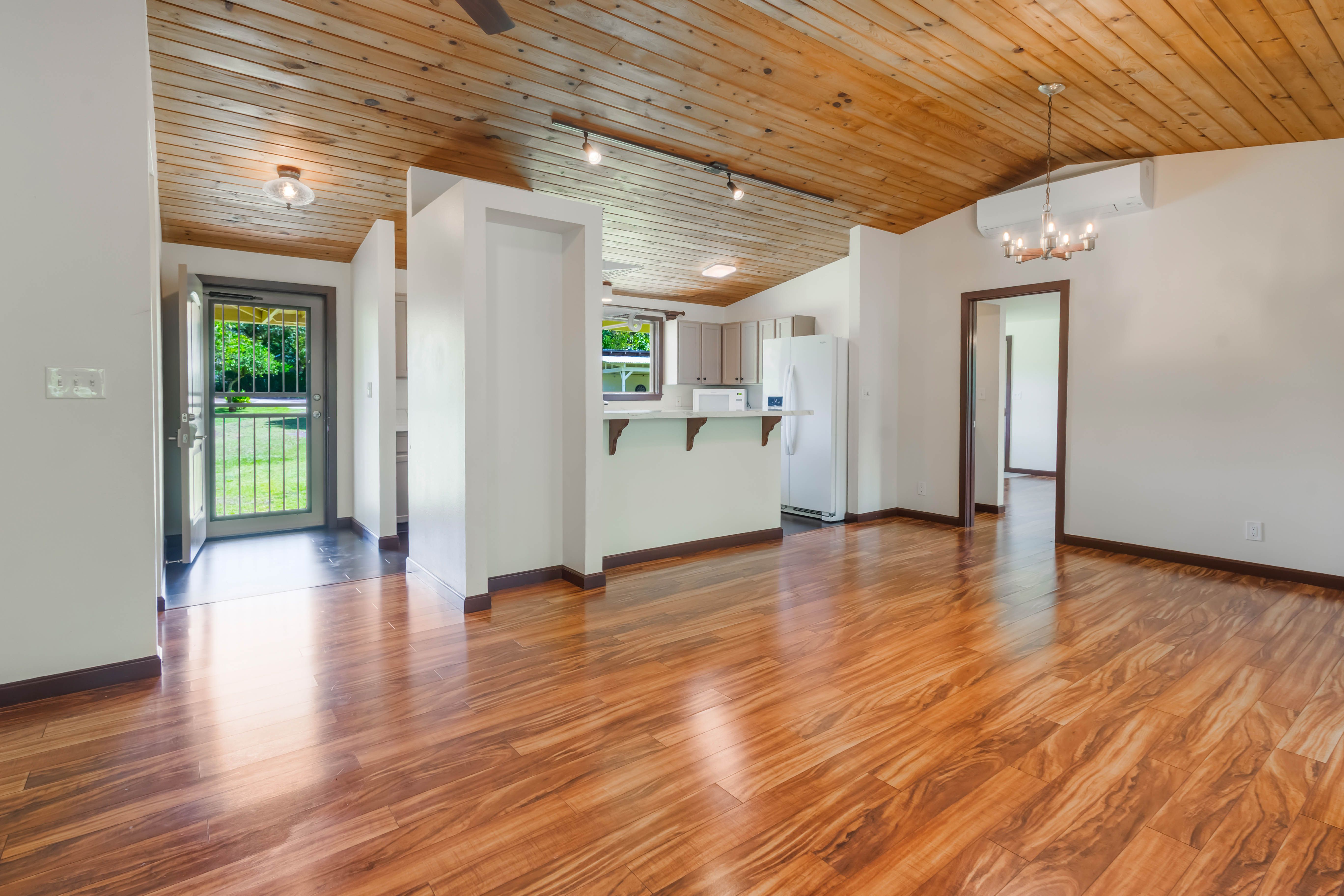 4085 B Noho Road Koloa, HI 96756 - Photo 8 of 30 a view of a livingroom with wooden floor