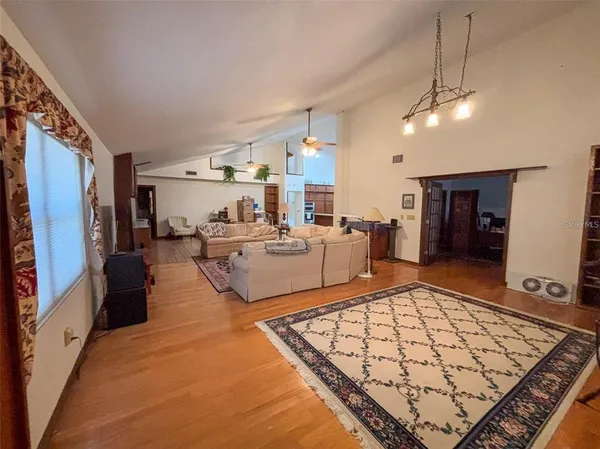 a dining room with furniture and a fireplace