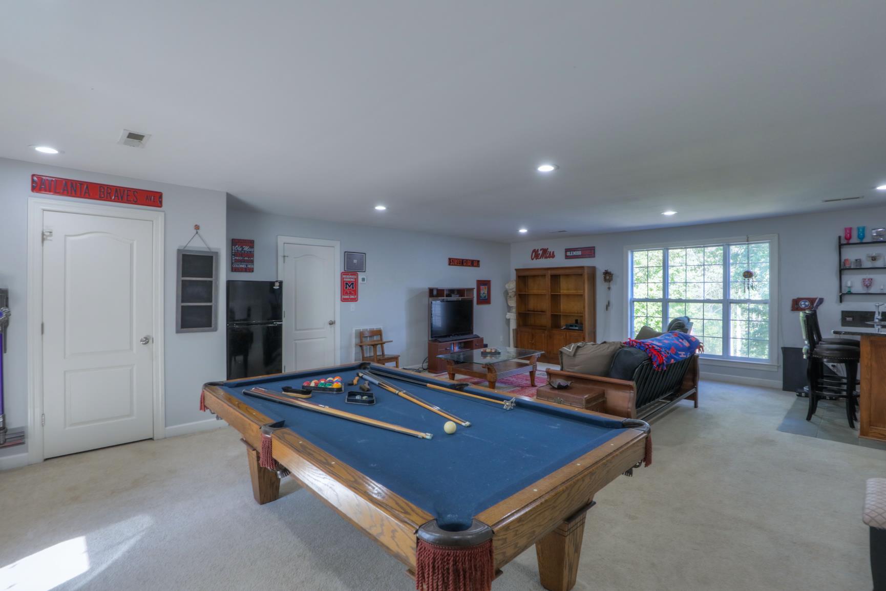 1287 Garton Road Burns, TN 37029 - Photo 20 of 29 a living room with furniture pool table and flat screen tv