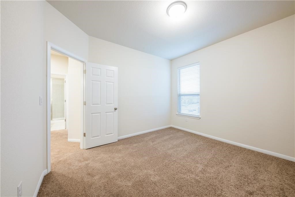 3810 Brushy Creek Road, Unit 67 Cedar Park, TX 78613 - Photo 11 of 19 an empty room with windows and closet