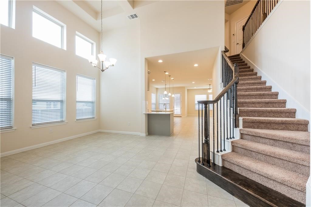 3810 Brushy Creek Road, Unit 67 Cedar Park, TX 78613 - Photo 5 of 19 wooden floor in an empty room with a window