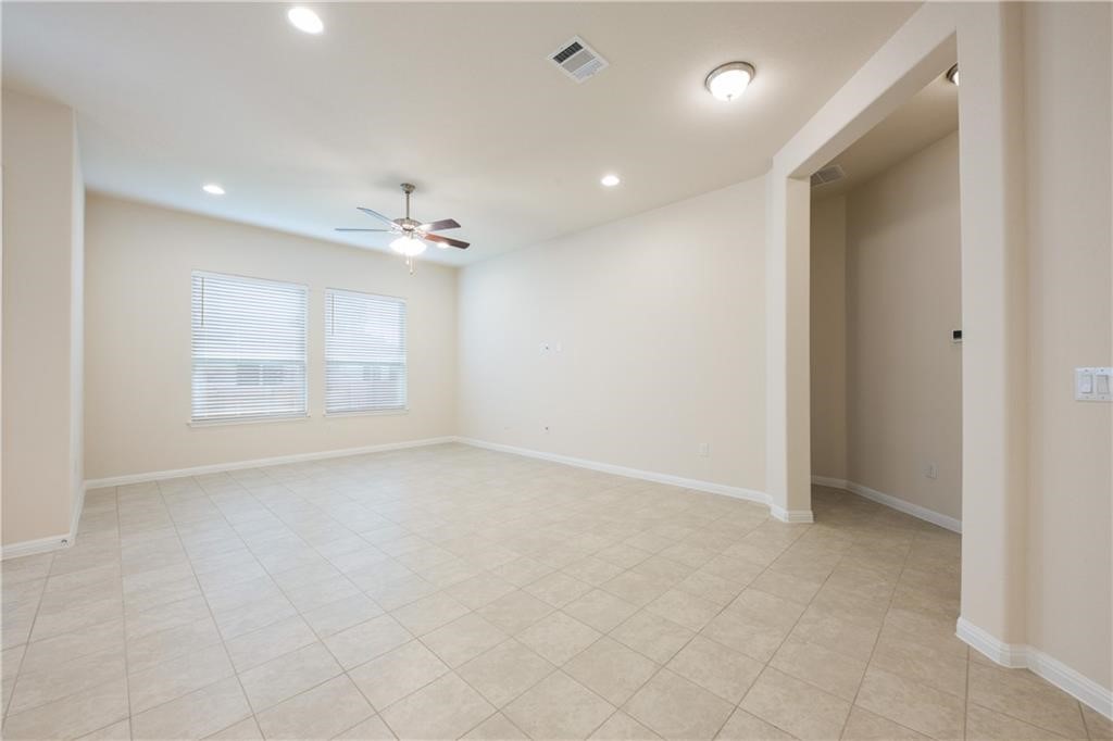 3810 Brushy Creek Road, Unit 67 Cedar Park, TX 78613 - Photo 8 of 19 wooden floor in an empty room with a window
