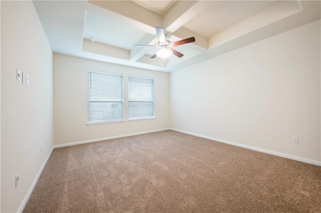 3810 Brushy Creek Road, Unit 67 Cedar Park, TX 78613 - Photo 9 of 19 an empty room with windows and fan